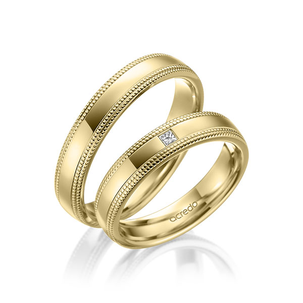 Paar klassische Trauringe/Eheringe in Gelbgold 585 mit zus. 0,03 ct. Prinzess-Diamant tw, vs von acredo