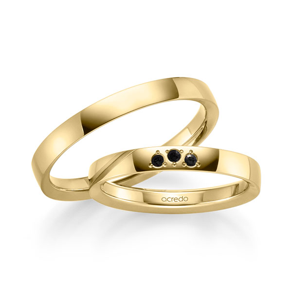 Paar klassische Trauringe/Eheringe in Gelbgold 585 mit zus. 0,045 ct. Brillant schwarz von acredo