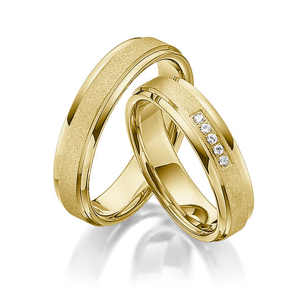 Paar klassische Trauringe/Eheringe in Gelbgold 585 mit zus. 0,05 ct. Brillant tw, si von Steinberg