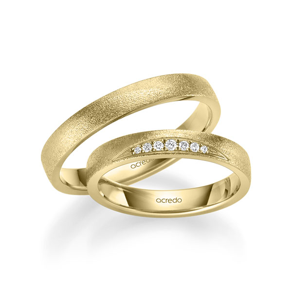 Paar klassische Trauringe/Eheringe in Gelbgold 585 mit zus. 0,061 ct. Brillant tw, si von acredo