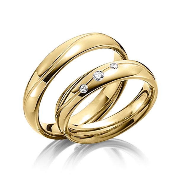 Paar klassische Trauringe/Eheringe in Gelbgold 585 mit zus. 0,08 ct. Brillant tw, si von Steinberg