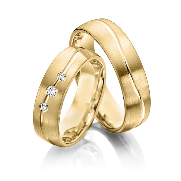 Paar klassische Trauringe/Eheringe in Gelbgold 585 mit zus. 0,08 ct. Brillant tw, si von Steinberg