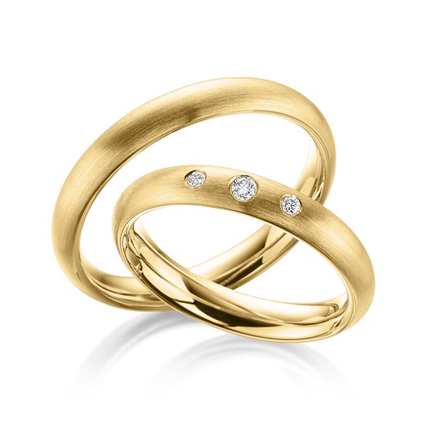 Paar klassische Trauringe/Eheringe in Gelbgold 585 mit zus. 0,08 ct. Brillant tw, si von Steinberg
