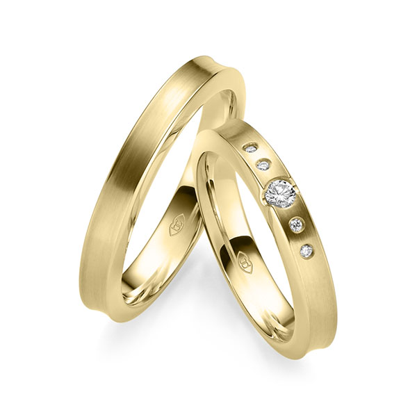 Paar klassische Trauringe/Eheringe in Gelbgold 585 mit zus. 0,092 ct. Brillant tw, si 