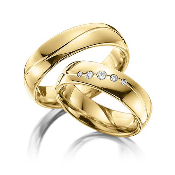 Paar klassische Trauringe/Eheringe in Gelbgold 585 mit zus. 0,09 ct. Brillant tw, si von Steinberg