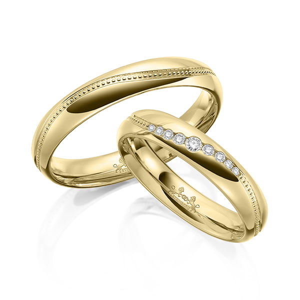 Paar klassische Trauringe/Eheringe in Gelbgold 585 mit zus. 0,104 ct. Brillant tw, si tw, vs von Steinberg