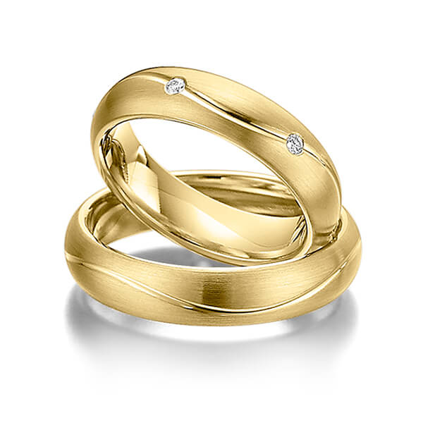 Paar klassische Trauringe/Eheringe in Gelbgold 585 mit zus. 0,12 ct. Brillant tw, si von Steinberg