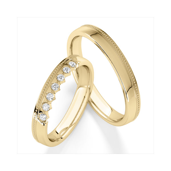 Paar klassische Trauringe/Eheringe in Gelbgold 585 mit zus. 0,14 ct. tw, vs von Steinberg