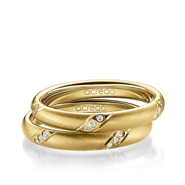 Paar klassische Trauringe/Eheringe in Gelbgold 585 mit zus. 0,15 ct. Brillant tw, si von acredo