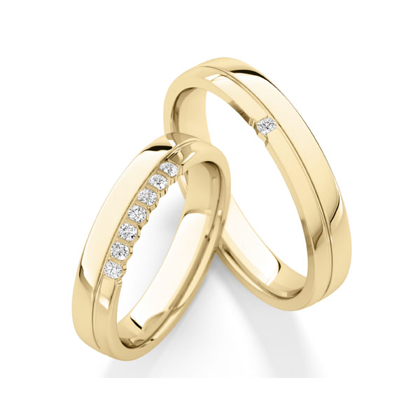 Paar klassische Trauringe/Eheringe in Gelbgold 585 mit zus. 0,16 ct. tw, vs von Steinberg