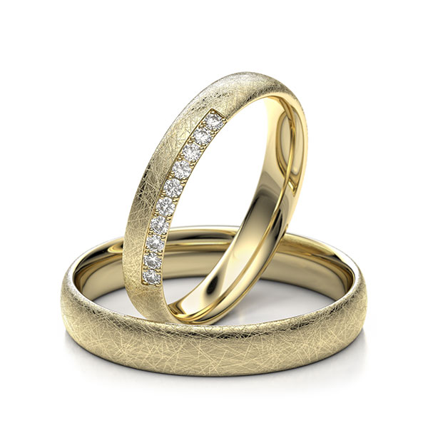 Paar klassische Trauringe/Eheringe in Gelbgold 585 mit zus. 0,1 ct. Brillant tw, si 