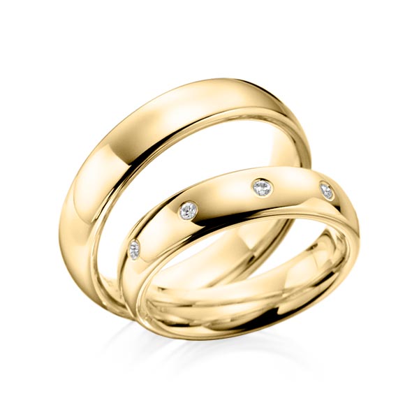 Paar klassische Trauringe/Eheringe in Gelbgold 585 mit zus. 0,1 ct. Brillant tw, si von Steinberg