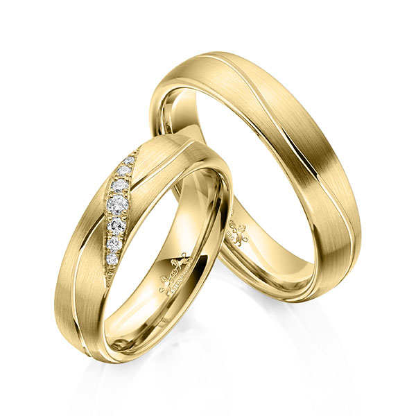Paar klassische Trauringe/Eheringe in Gelbgold 585 mit zus. 0,1 ct. Brillant tw, si von Steinberg