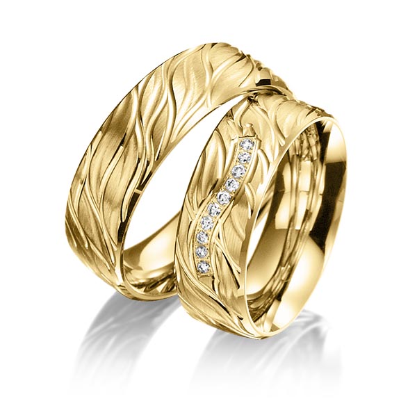 Paar klassische Trauringe/Eheringe in Gelbgold 585 mit zus. 0,1 ct. Brillant tw, si von Steinberg