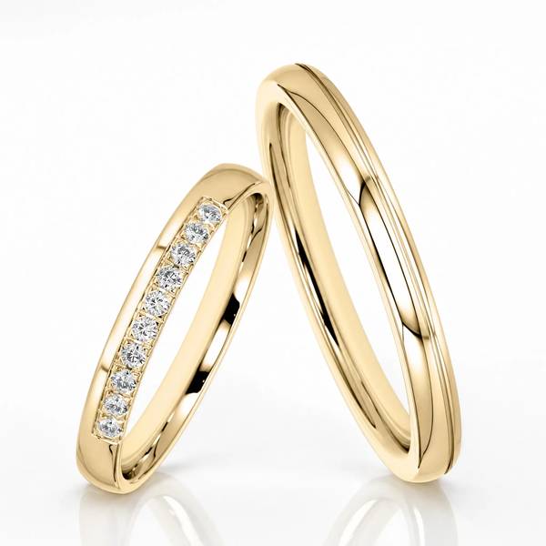 Paar klassische Trauringe/Eheringe in Gelbgold 585 mit zus. 0,1 ct. Brillant von Steinberg
