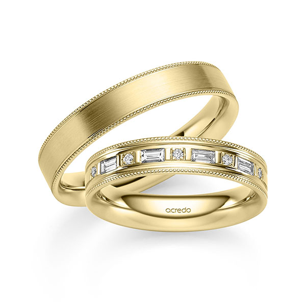 Paar klassische Trauringe/Eheringe in Gelbgold 585 mit zus. 0,25 ct. Baguette-Diamant & Brillant tw, vs von acredo