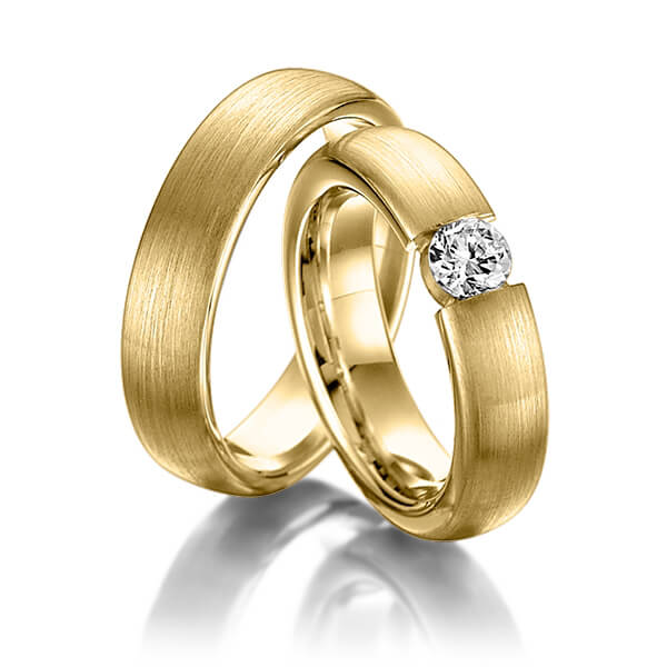 Paar klassische Trauringe/Eheringe in Gelbgold 585 mit zus. 0,25 ct. Brillant tw, si von Steinberg