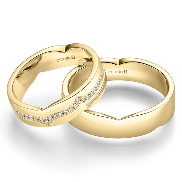 Paar klassische Trauringe/Eheringe in Gelbgold 585 mit zus. 0,27 ct. Brillant tw, si von acredo