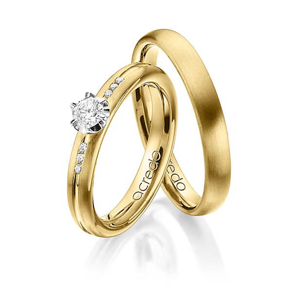 Paar klassische Trauringe/Eheringe in Gelbgold 585 mit zus. 0,298 ct. Brillant tw, si von acredo