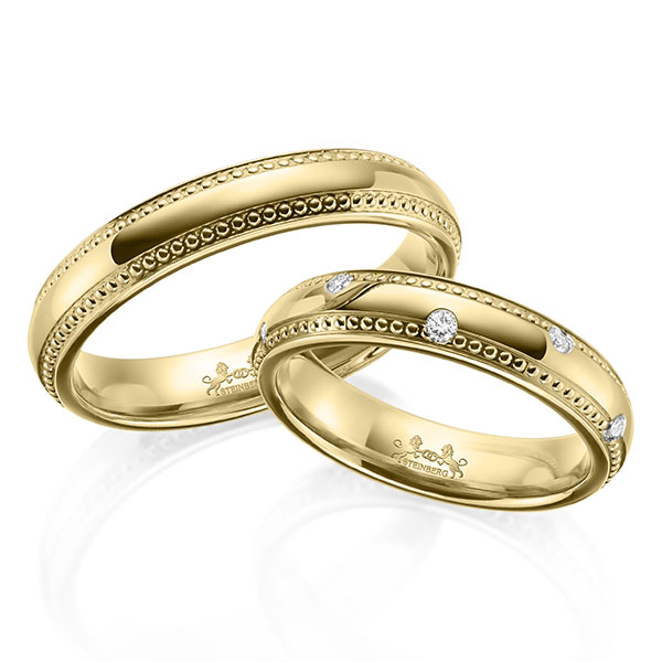 Paar klassische Trauringe/Eheringe in Gelbgold 585 mit zus. 0,2 ct. Brillant tw, si von Steinberg