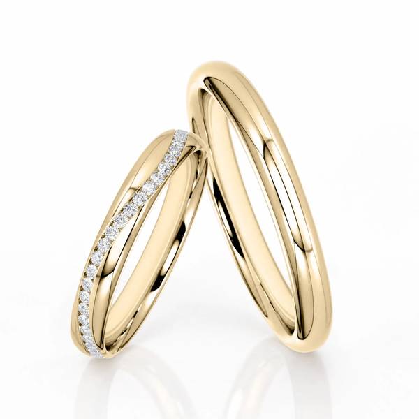 Paar klassische Trauringe/Eheringe in Gelbgold 585 mit zus. 0,2 ct. Brillant von Steinberg