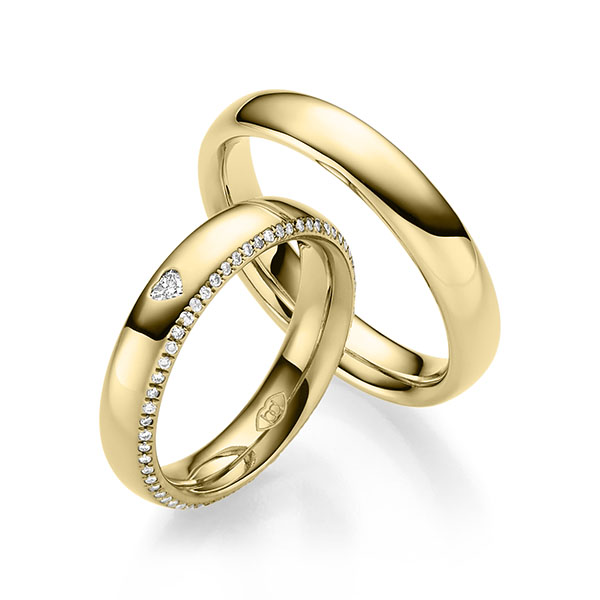 Paar klassische Trauringe/Eheringe in Gelbgold 585 mit zus. 0,308 ct. Herz-Diamant & Brillant tw, vs tw, si 