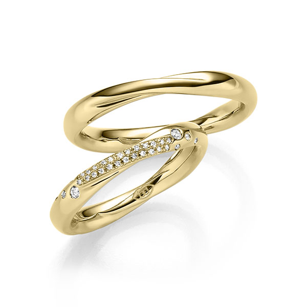 Paar klassische Trauringe/Eheringe in Gelbgold 585 mit zus. 0,3 ct. Brillant tw, si 