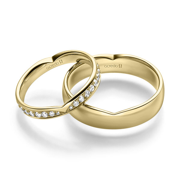 Paar klassische Trauringe/Eheringe in Gelbgold 585 mit zus. 0,6 ct. Brillant tw, si von acredo