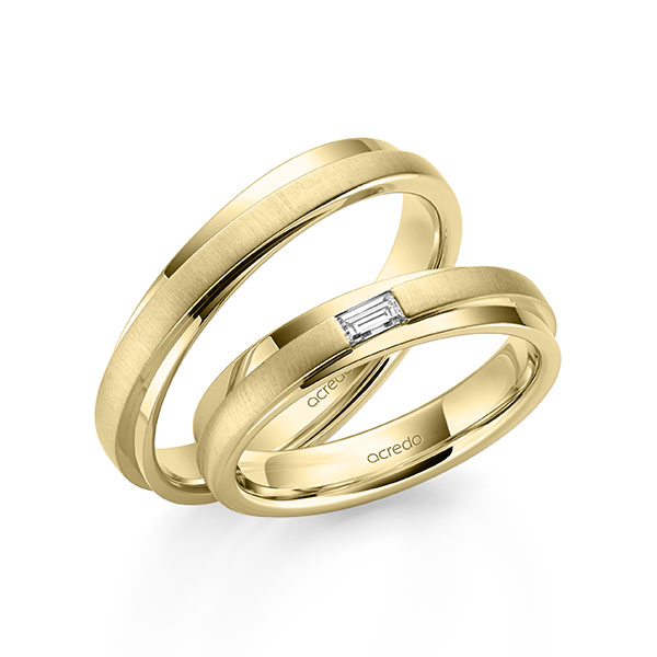 Paar klassische Trauringe/Eheringe in Gelbgold 750 mit zus. 0,1 ct. Baguette-Diamant tw, vs von acredo - A-2163-2