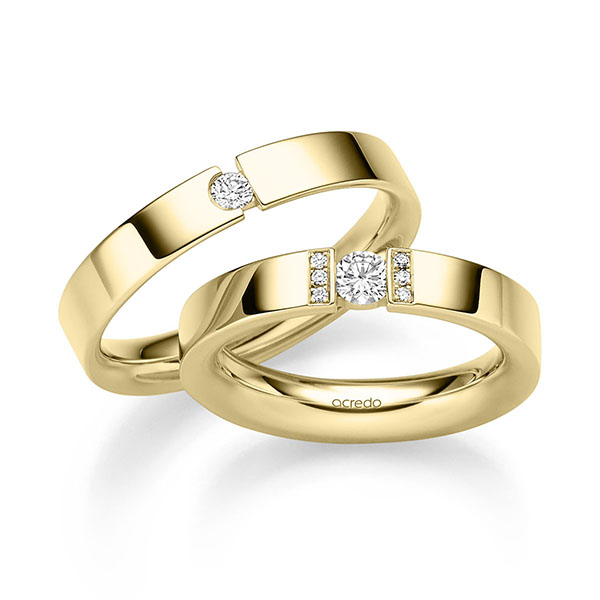 Paar klassische Trauringe/Eheringe in Gelbgold 750 mit zus. 0,24 ct. Brillant tw, si von acredo
