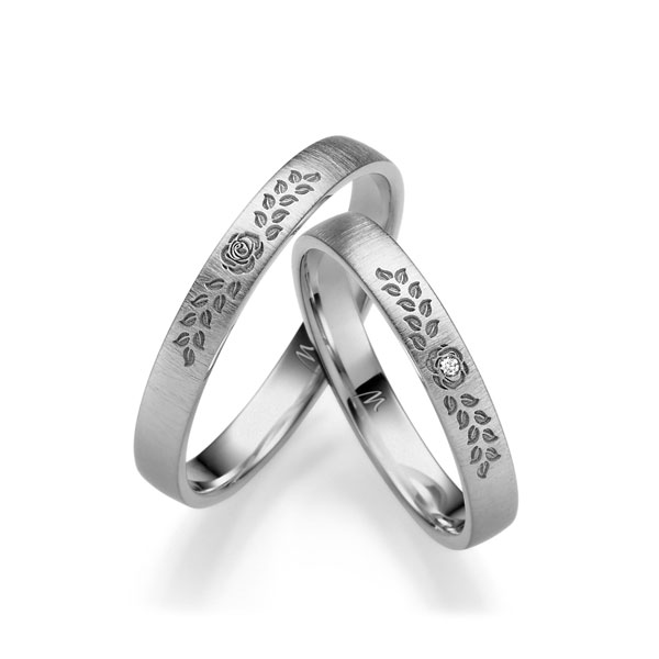 Paar klassische Trauringe/Eheringe in Graugold 585 mit zus. 0,01 ct. Brillant tw, si von Merii