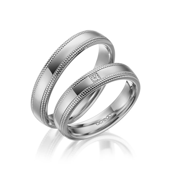 Paar klassische Trauringe/Eheringe in Graugold 585 mit zus. 0,03 ct. Prinzess-Diamant tw, vs von acredo