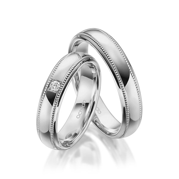 Paar klassische Trauringe/Eheringe in Graugold 585 mit zus. 0,05 ct. Brillant tw, si von acredo