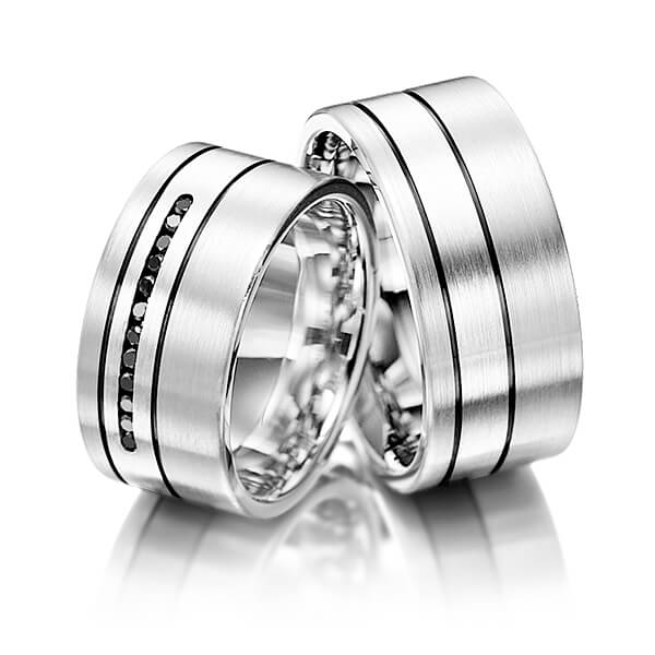 Paar klassische Trauringe/Eheringe in Graugold 585 mit zus. 0,12 ct. Brillant schwarz von Merii