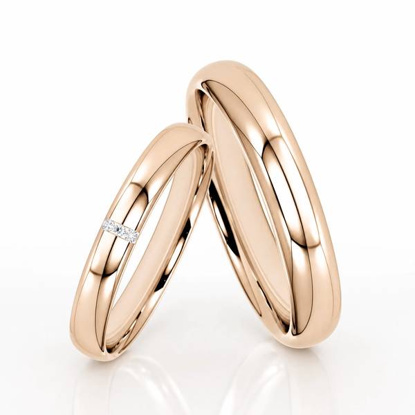 Paar klassische Trauringe/Eheringe in Peach-Gold 585 mit zus. 0,015 ct. Brillant von Steinberg