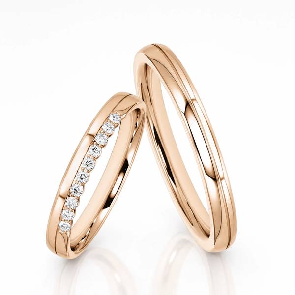Paar klassische Trauringe/Eheringe in Peach-Gold 585 mit zus. 0,1 ct. von Steinberg