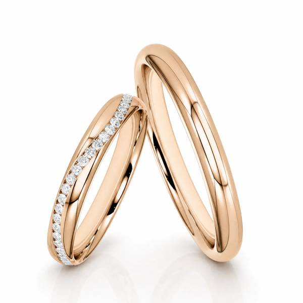 Paar klassische Trauringe/Eheringe in Peach-Gold 585 mit zus. 0,2 ct. Brillant von Steinberg