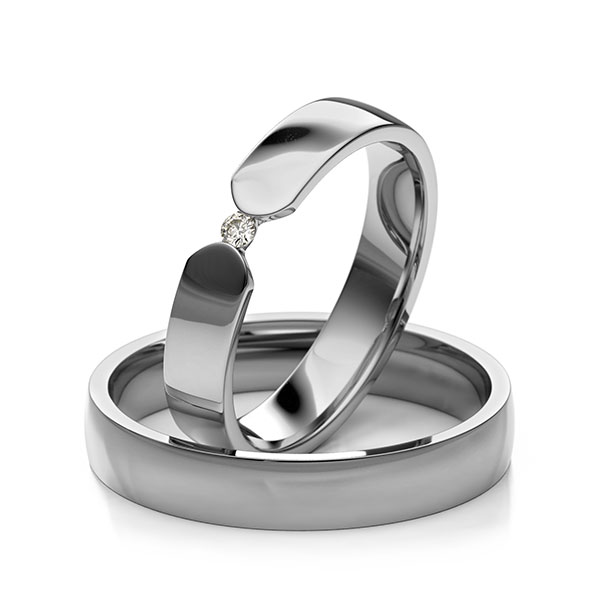 Paar klassische Trauringe/Eheringe in Platin 600 mit zus. 0,03 ct. Brillant tw, si 