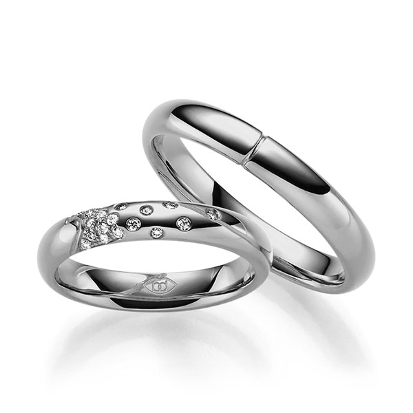Paar klassische Trauringe/Eheringe in Platin 600 mit zus. 0,111 ct. Brillant tw, si 
