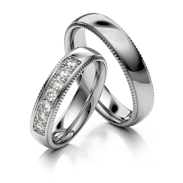Paar klassische Trauringe/Eheringe in Platin 600 mit zus. 0,35 ct. Brillant tw, si 