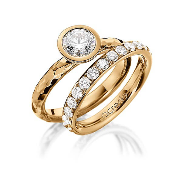 Paar klassische Trauringe/Eheringe in Roségold 585 gehämmert Struktur mit 1 ct. + zus. 1,35 ct. Brillant r, if von acredo