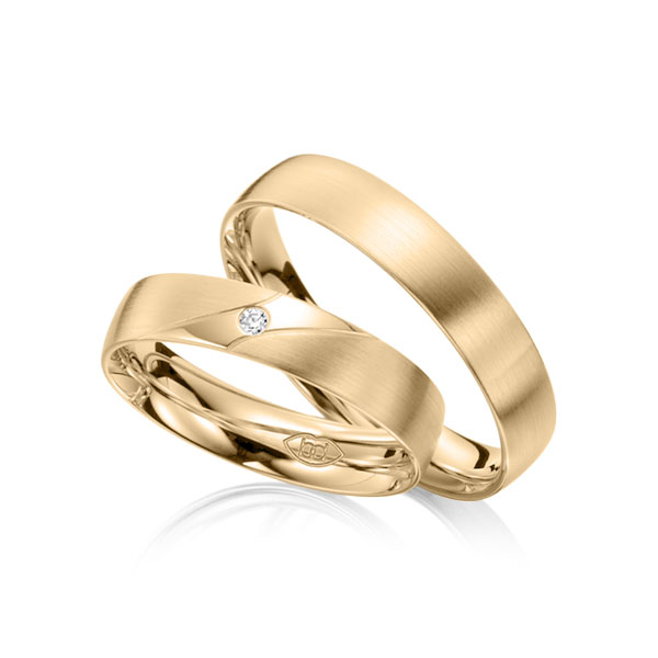 Paar klassische Trauringe/Eheringe in Roségold 585 mit zus. 0,02 ct. Brillant tw, si 