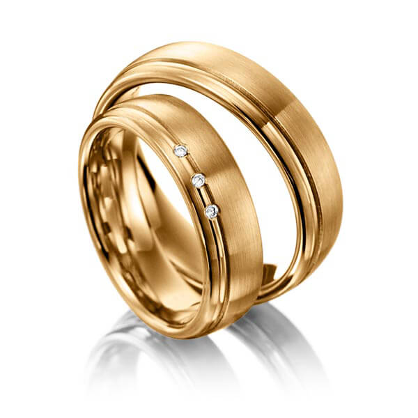 Paar klassische Trauringe/Eheringe in Roségold 585 mit zus. 0,03 ct. Brillant tw, vs von acredo