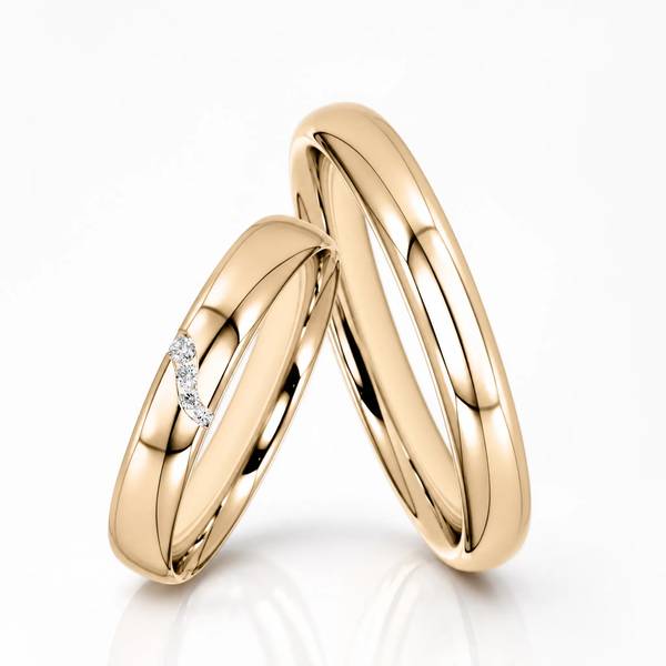 Paar klassische Trauringe/Eheringe in Roségold 585 mit zus. 0,03 ct. Brillant von Steinberg
