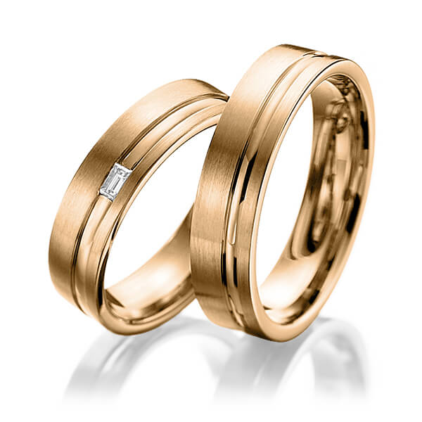 Paar klassische Trauringe/Eheringe in Roségold 585 mit zus. 0,06 ct. Baguette-Diamant tw, vs von 123GOLD