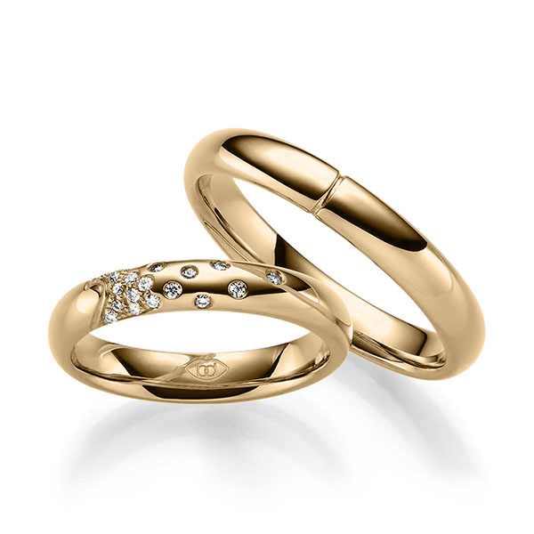 Paar klassische Trauringe/Eheringe in Roségold 585 mit zus. 0,111 ct. Brillant tw, si 