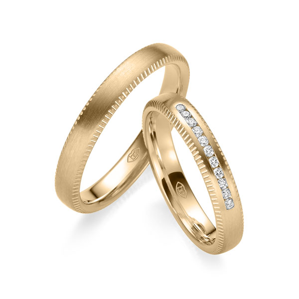 Paar klassische Trauringe/Eheringe in Roségold 585 mit zus. 0,11 ct. Brillant tw, si 