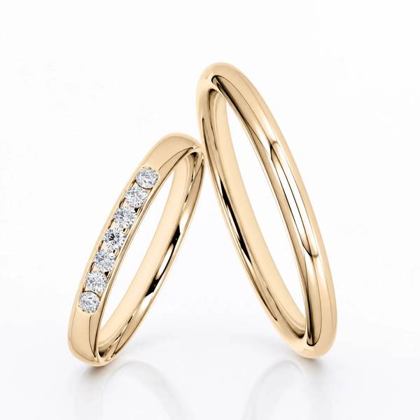 Paar klassische Trauringe/Eheringe in Roségold 585 mit zus. 0,14 ct. Brillant von Steinberg