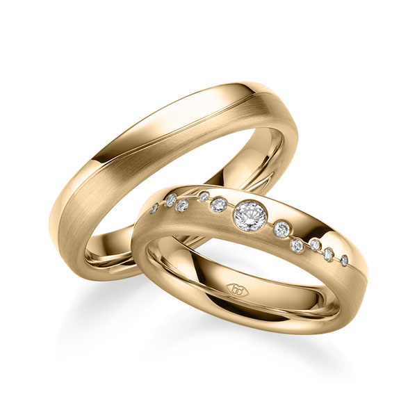 Paar klassische Trauringe/Eheringe in Roségold 585 mit zus. 0,182 ct. Brillant tw, si 