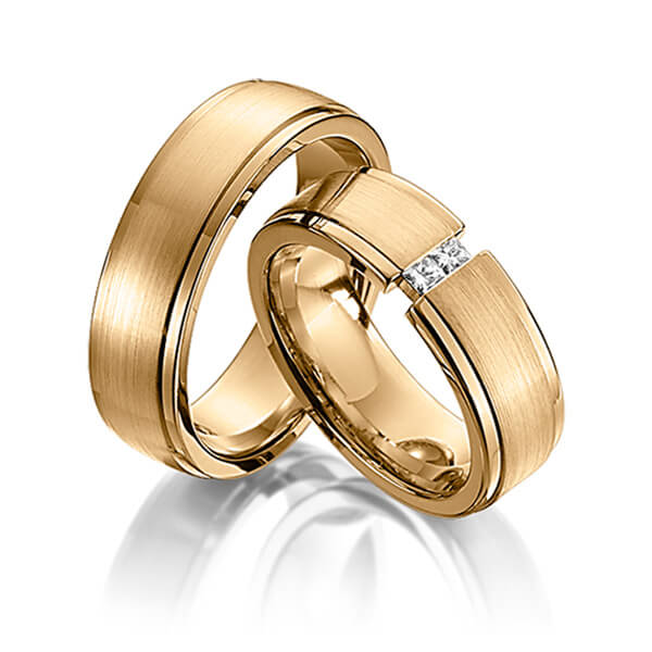 Paar klassische Trauringe/Eheringe in Roségold 585 mit zus. 0,1 ct. Prinzess-Diamant tw, si von Steinberg